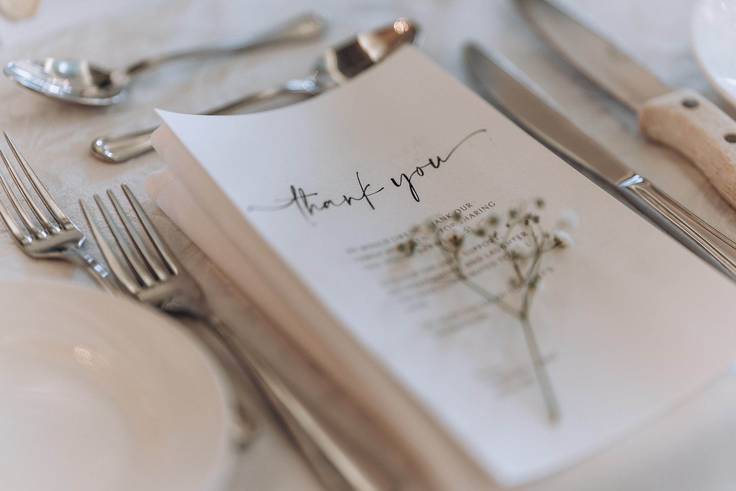 detail image of the menu at a wedding reception dinner