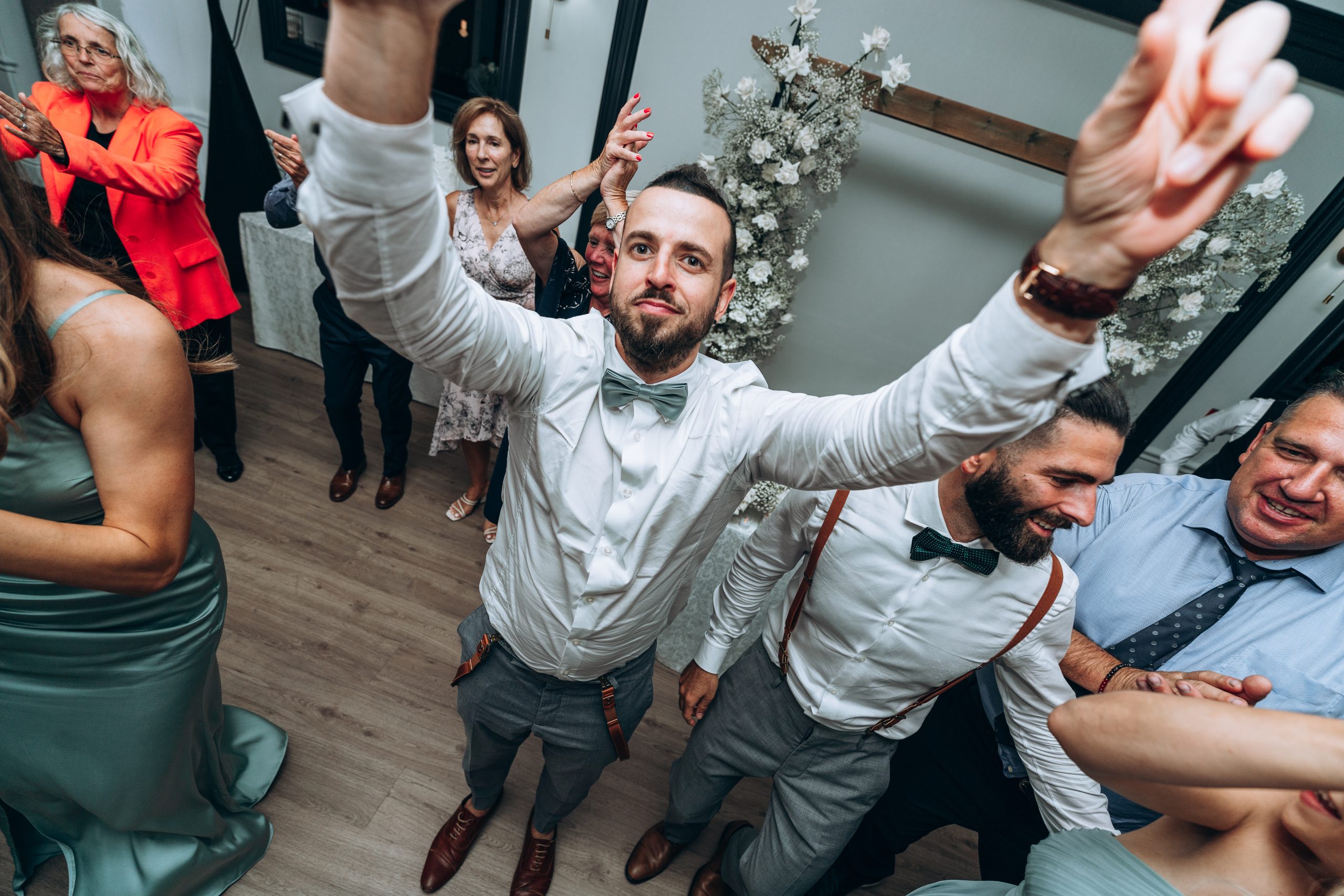 guest hits the dance floor during a wedding reception